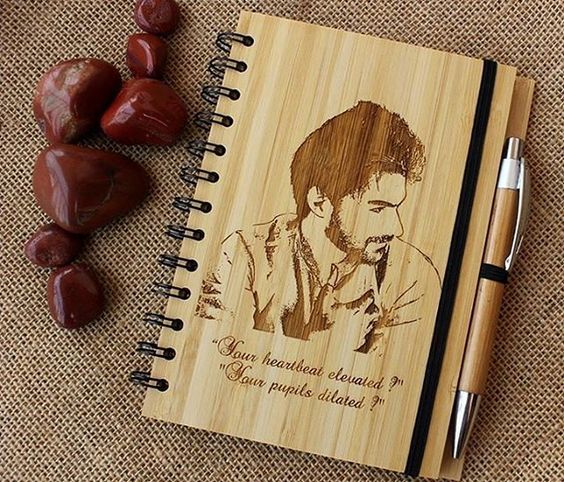 wooden diary with pen